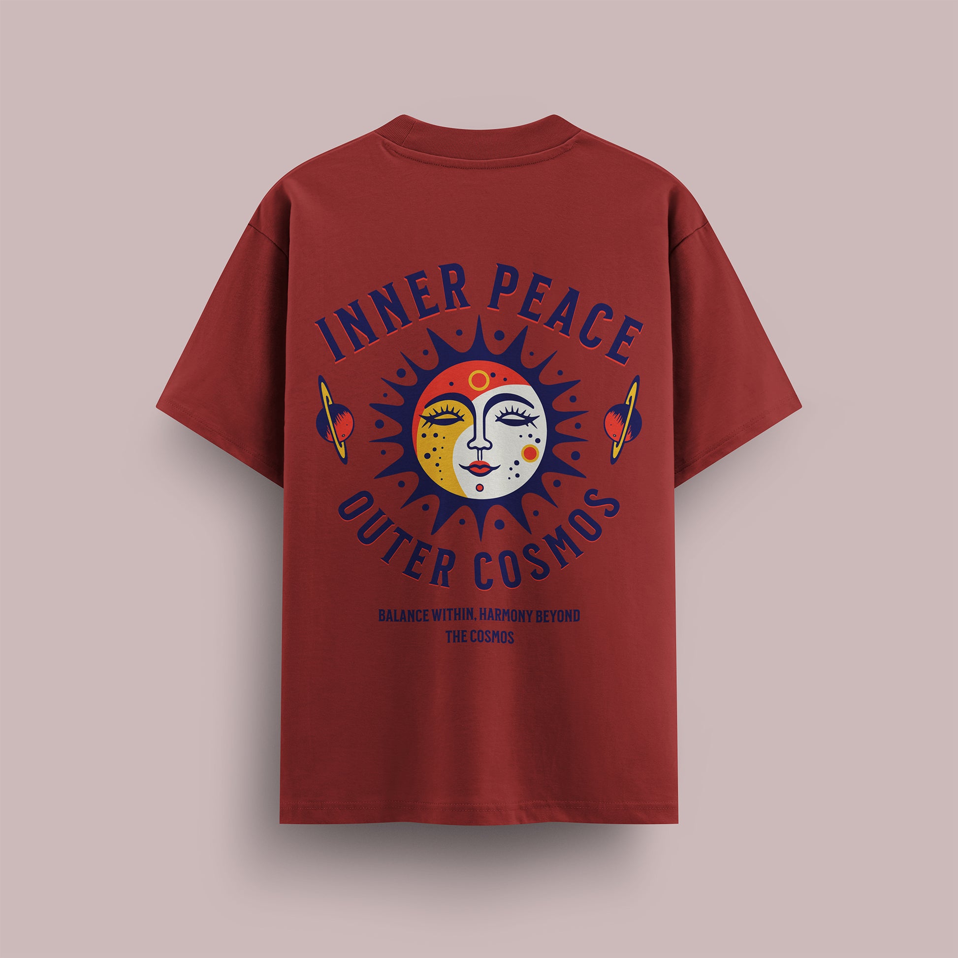Red t-shirt with 'Inner Peace Outer Cosmos' design on a beige background