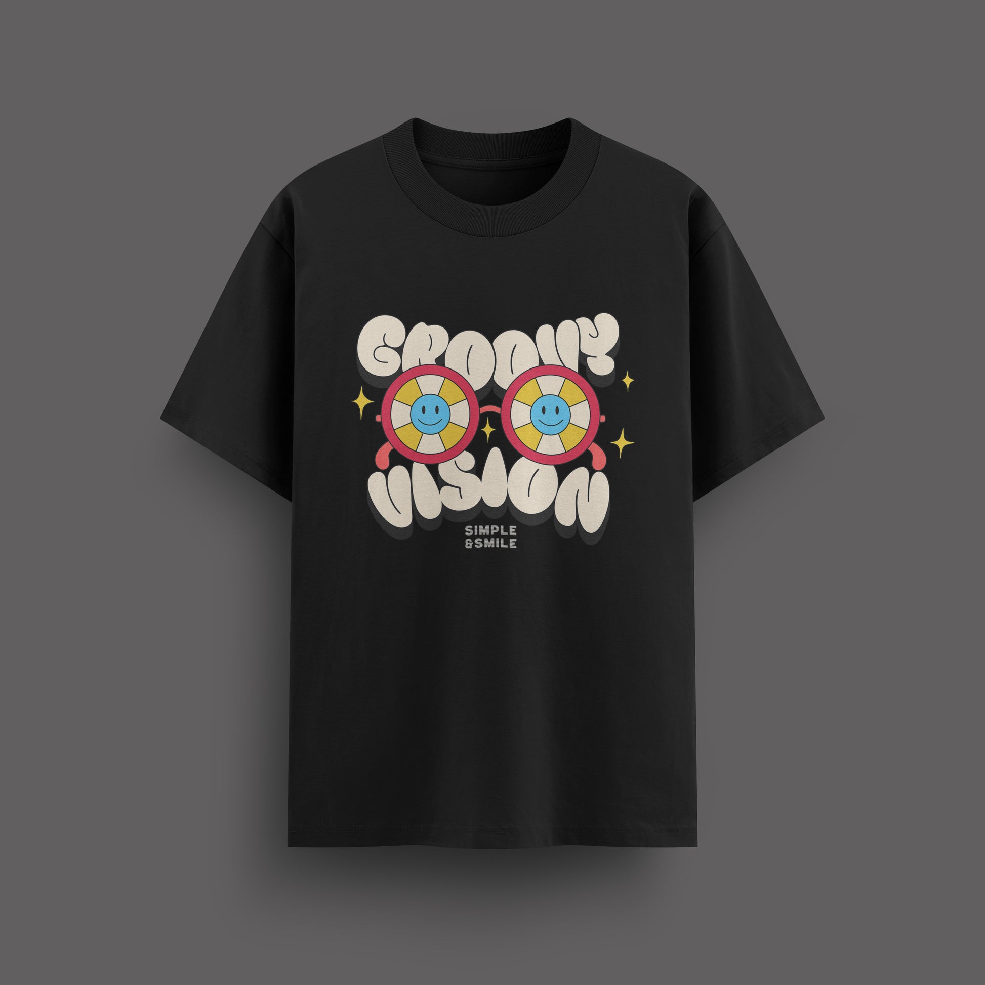Black t-shirt with colorful graphic design on a dark background