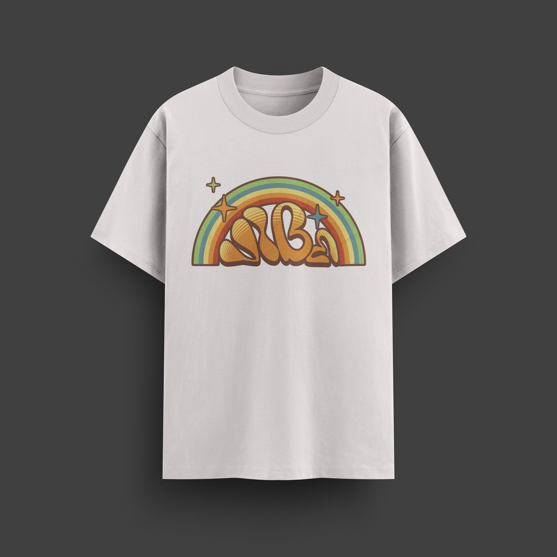 White t-shirt with a colorful rainbow and letter design on a dark background