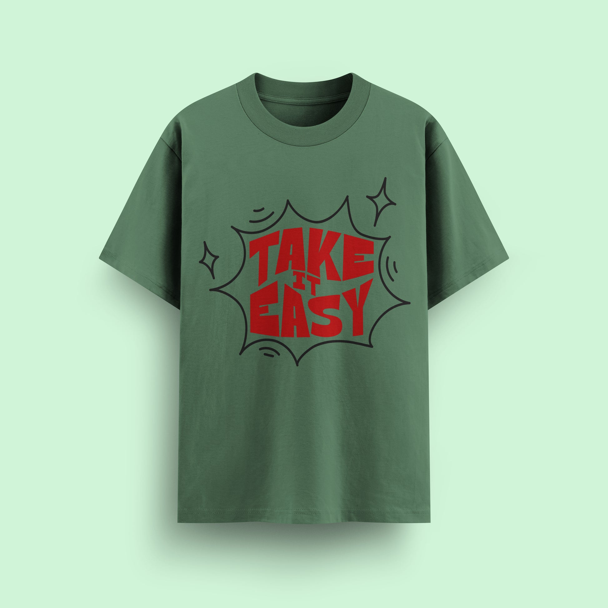 Green t-shirt with red and black text 'TAKE IT EASY' on a light green background