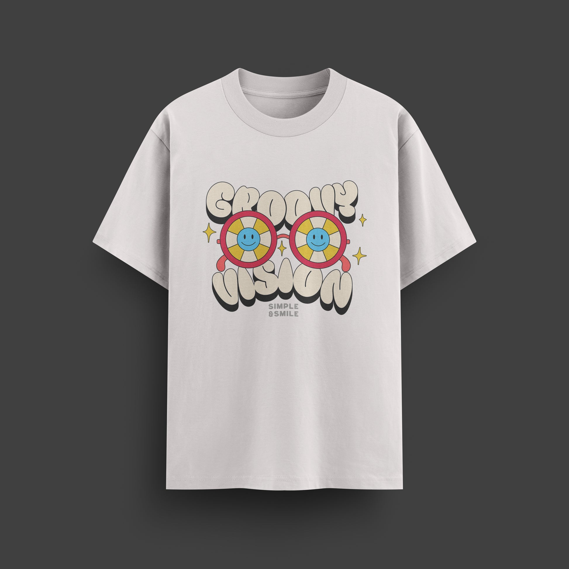 White t-shirt with colorful graphic design on a dark background
