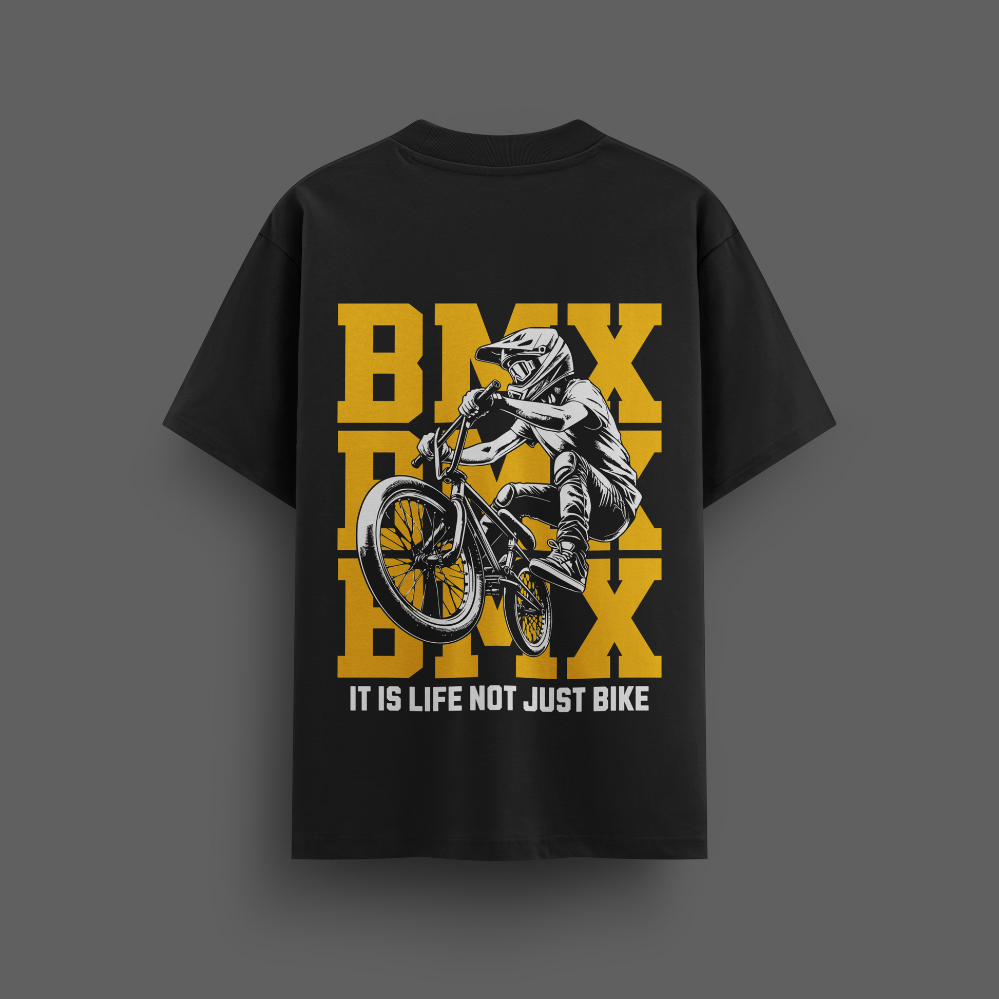 Black t-shirt with BMX graphic and text on a dark gray background