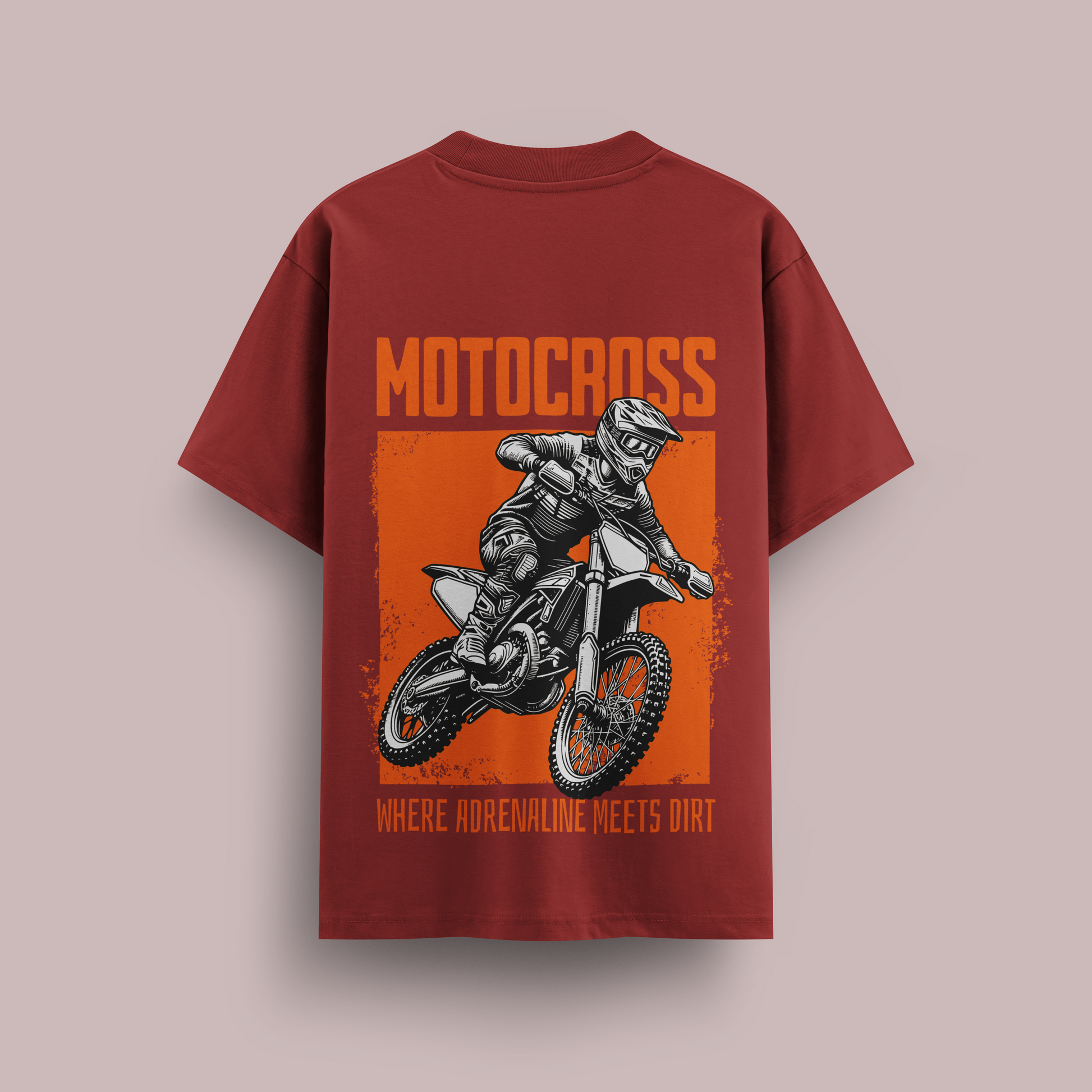 Red t-shirt with motocross graphic and text on a beige background