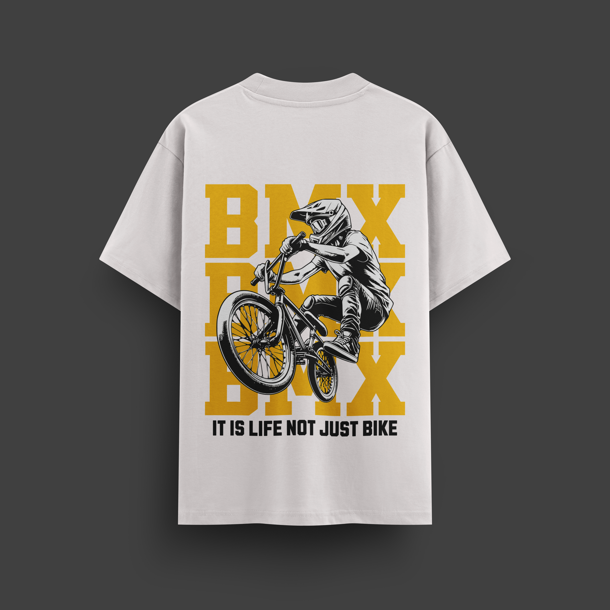 White t-shirt with BMX graphic and text on a dark gray background