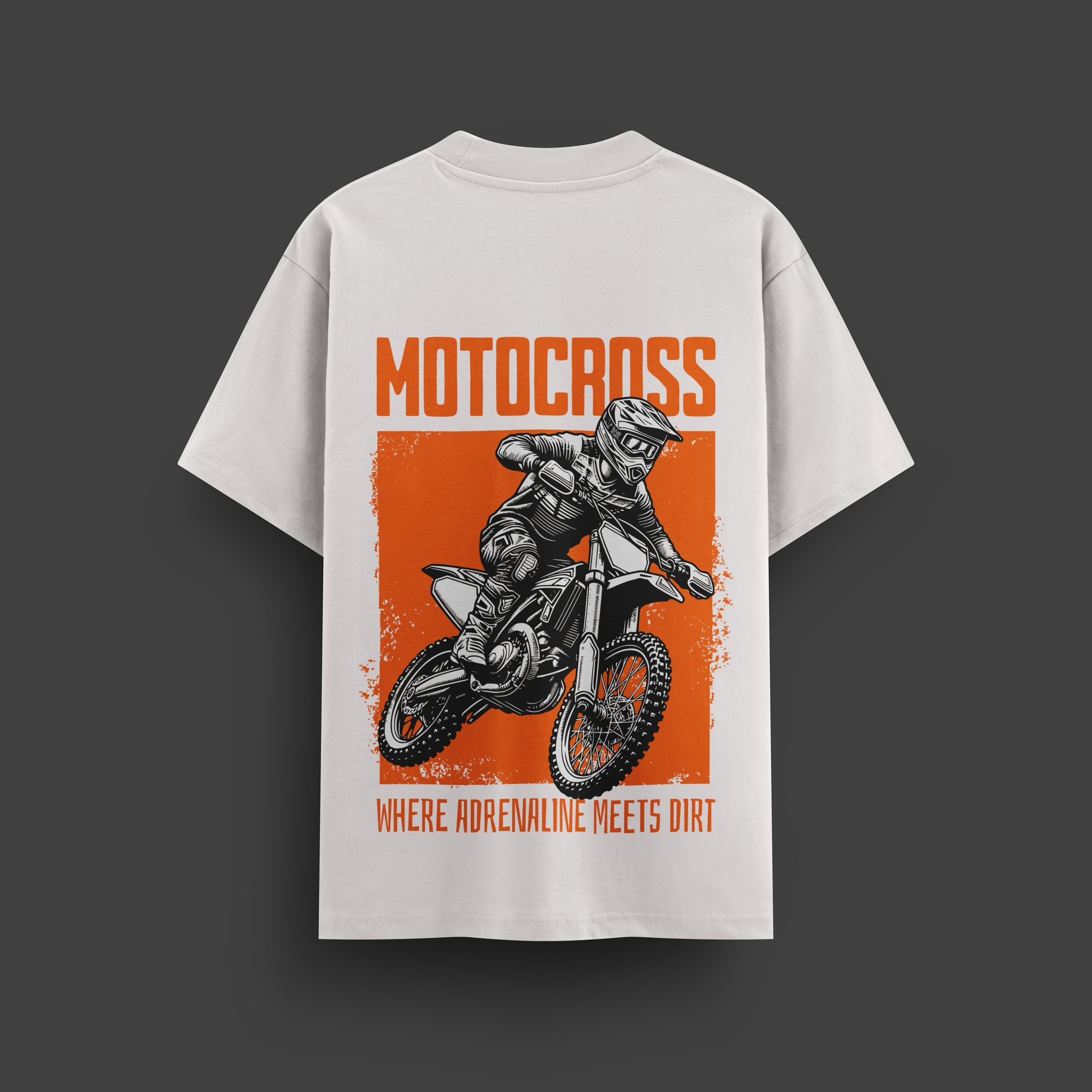 White t-shirt with motocross graphic and text on a dark gray background