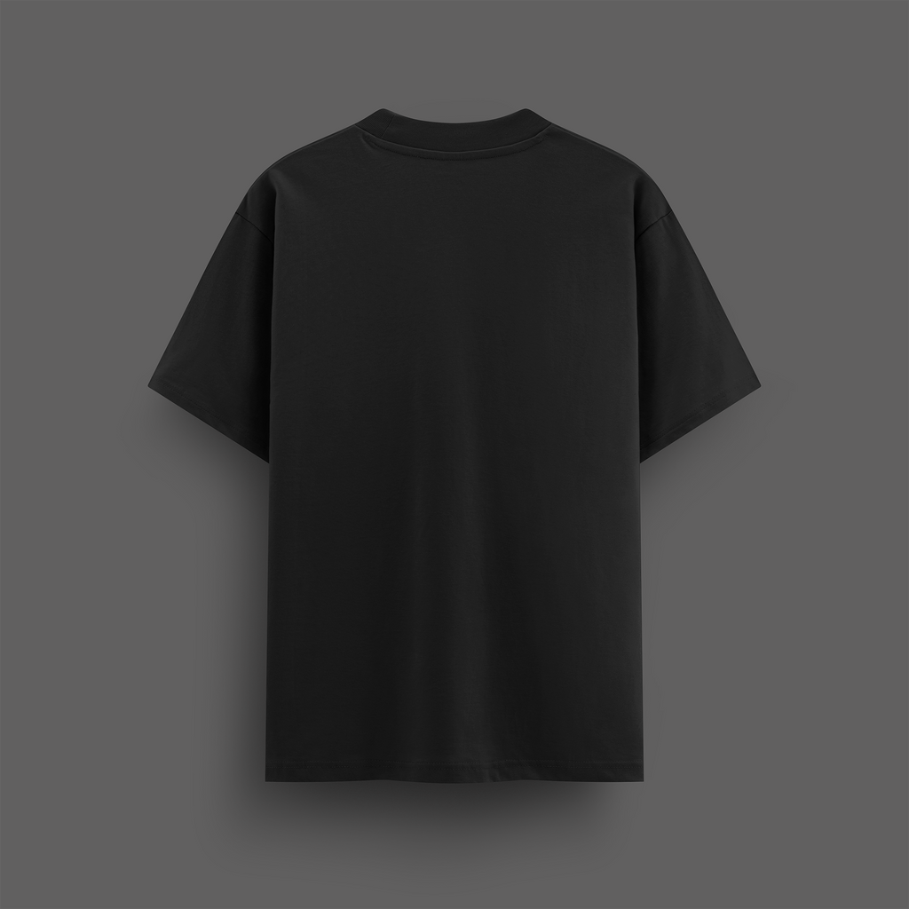 Black oversize t-shirt on a gray background