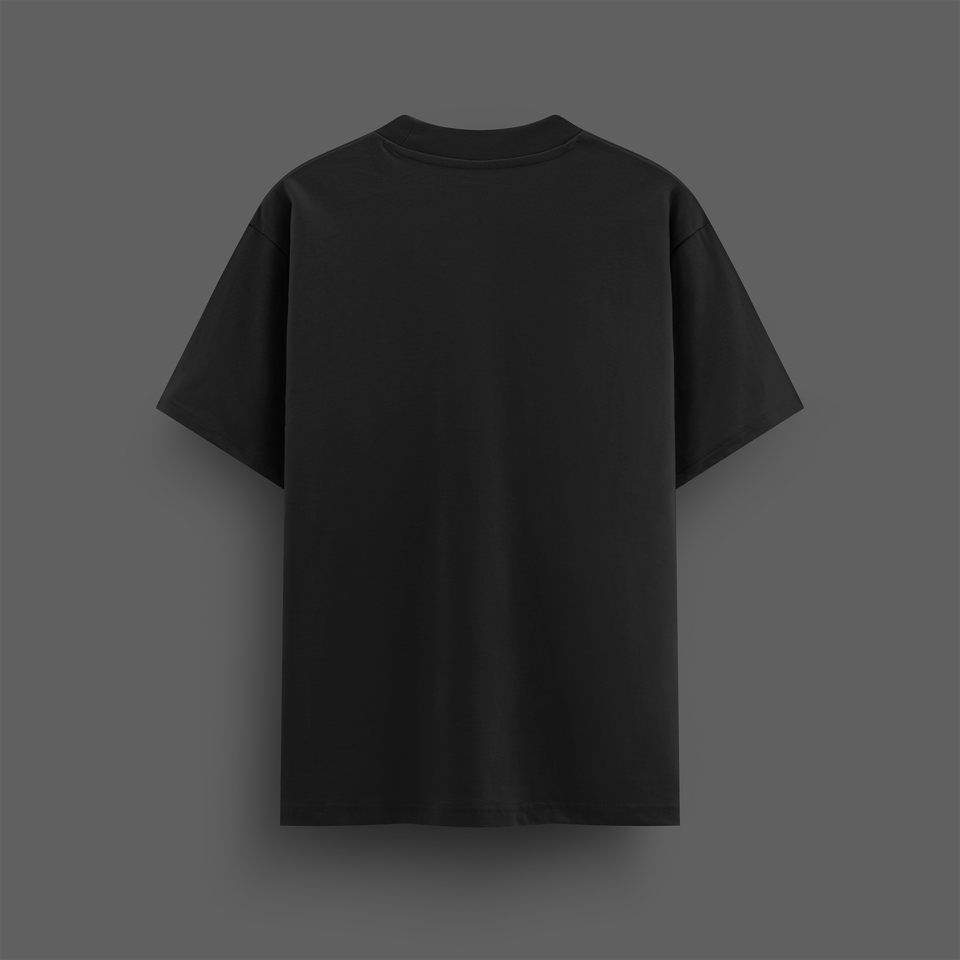 Black oversize t-shirt on a gray background