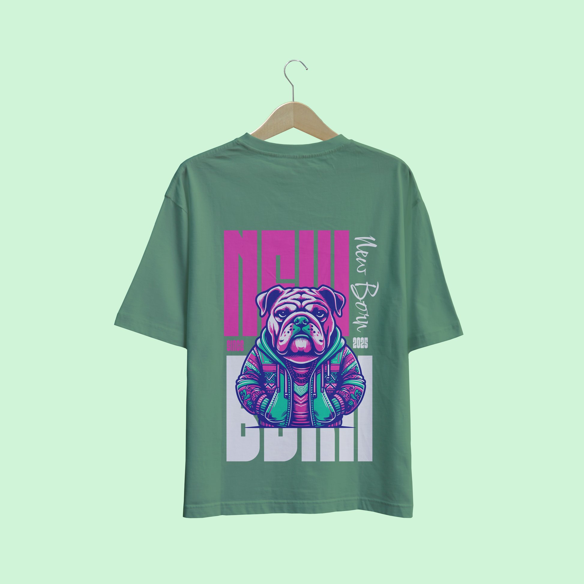 Green oversize t-shirt with a graphic of a bulldog and text on a light green background