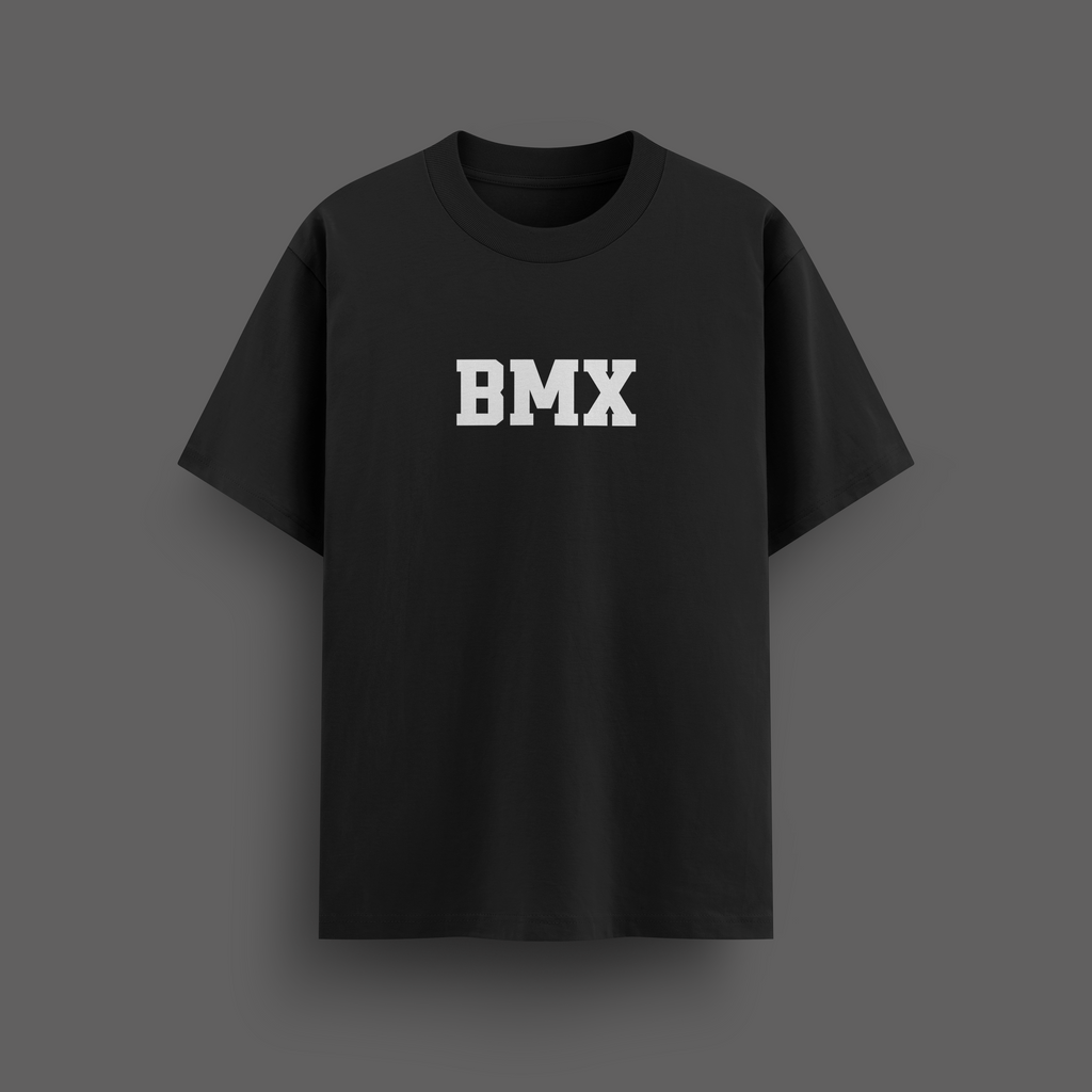 Black t-shirt with 'BMX' printed on it against a dark background