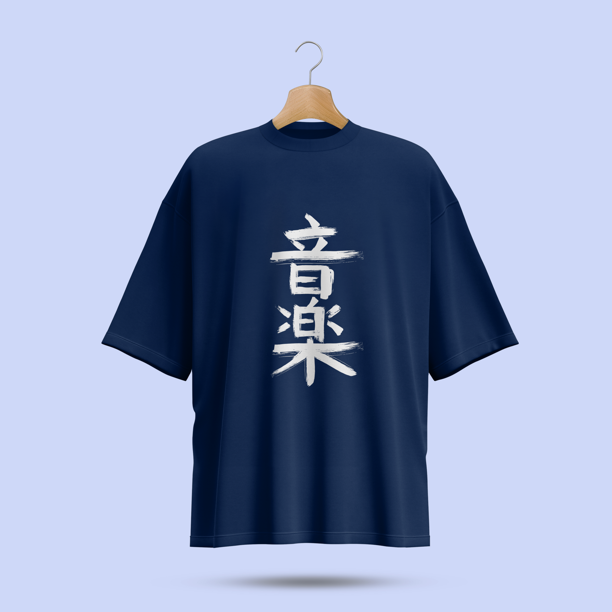 Navy blue oversize t-shirt with white Japanese characters on a light blue background