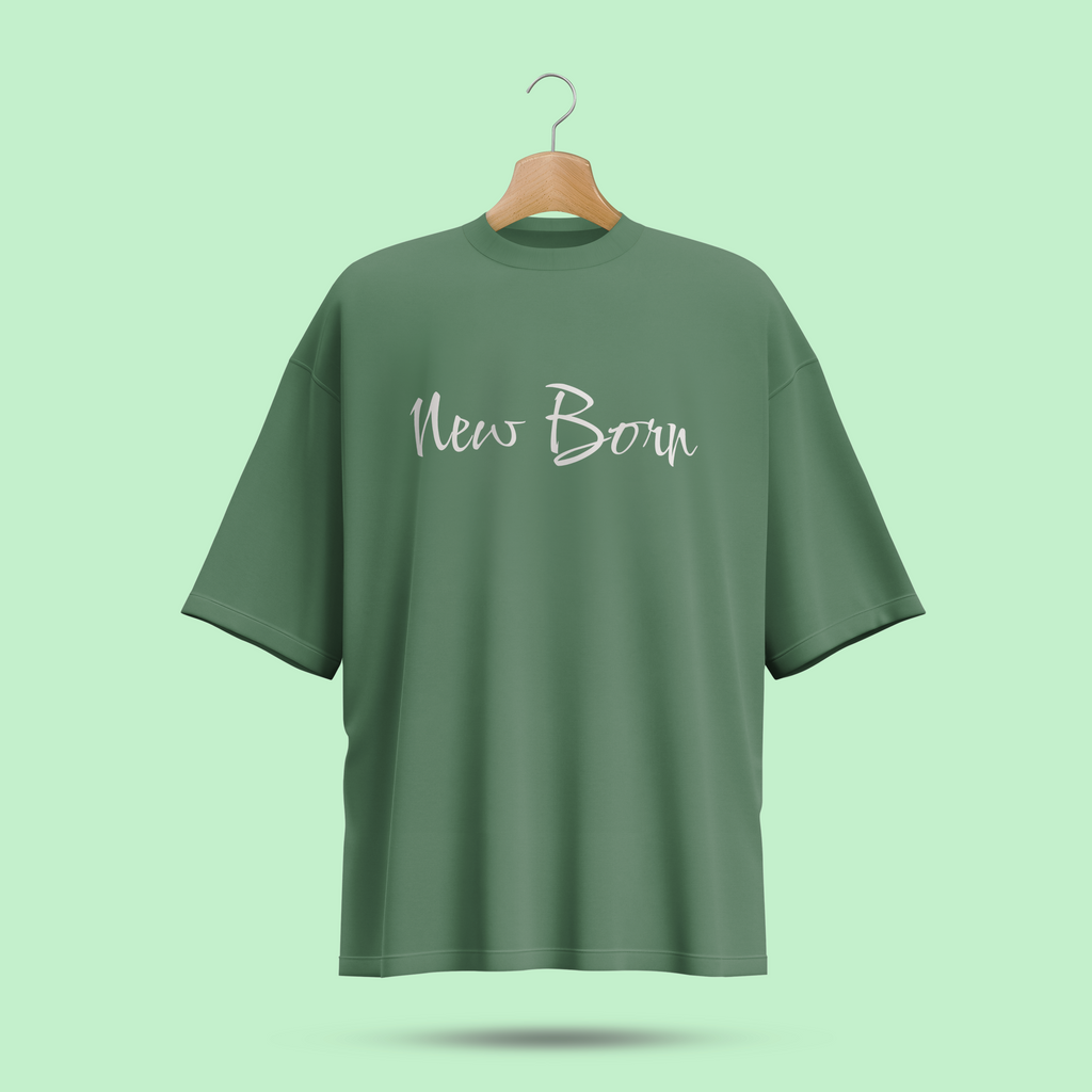 Green oversize t-shirt with 'New Born' text on a hanger against a light green background