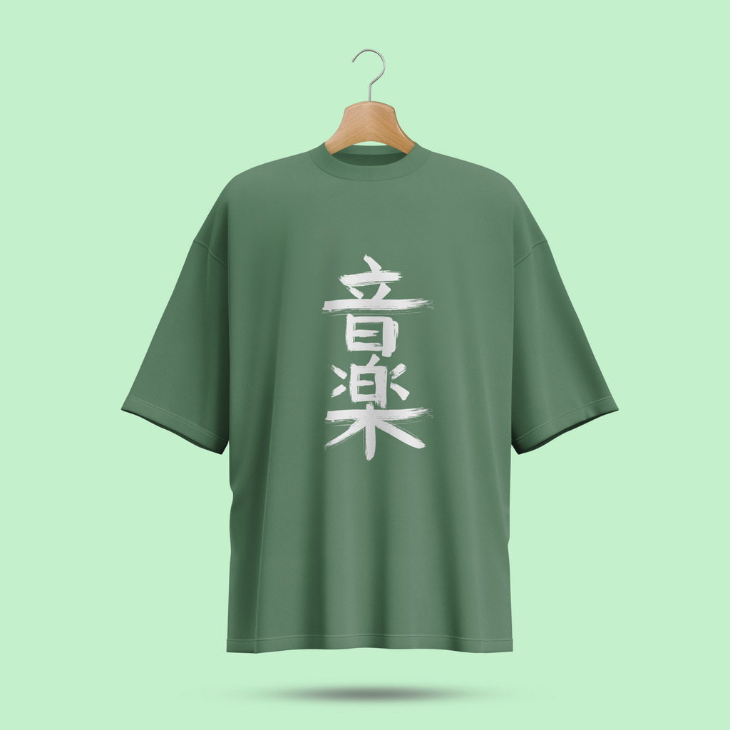 Green oversize t-shirt with white text on a hanger against a light green background