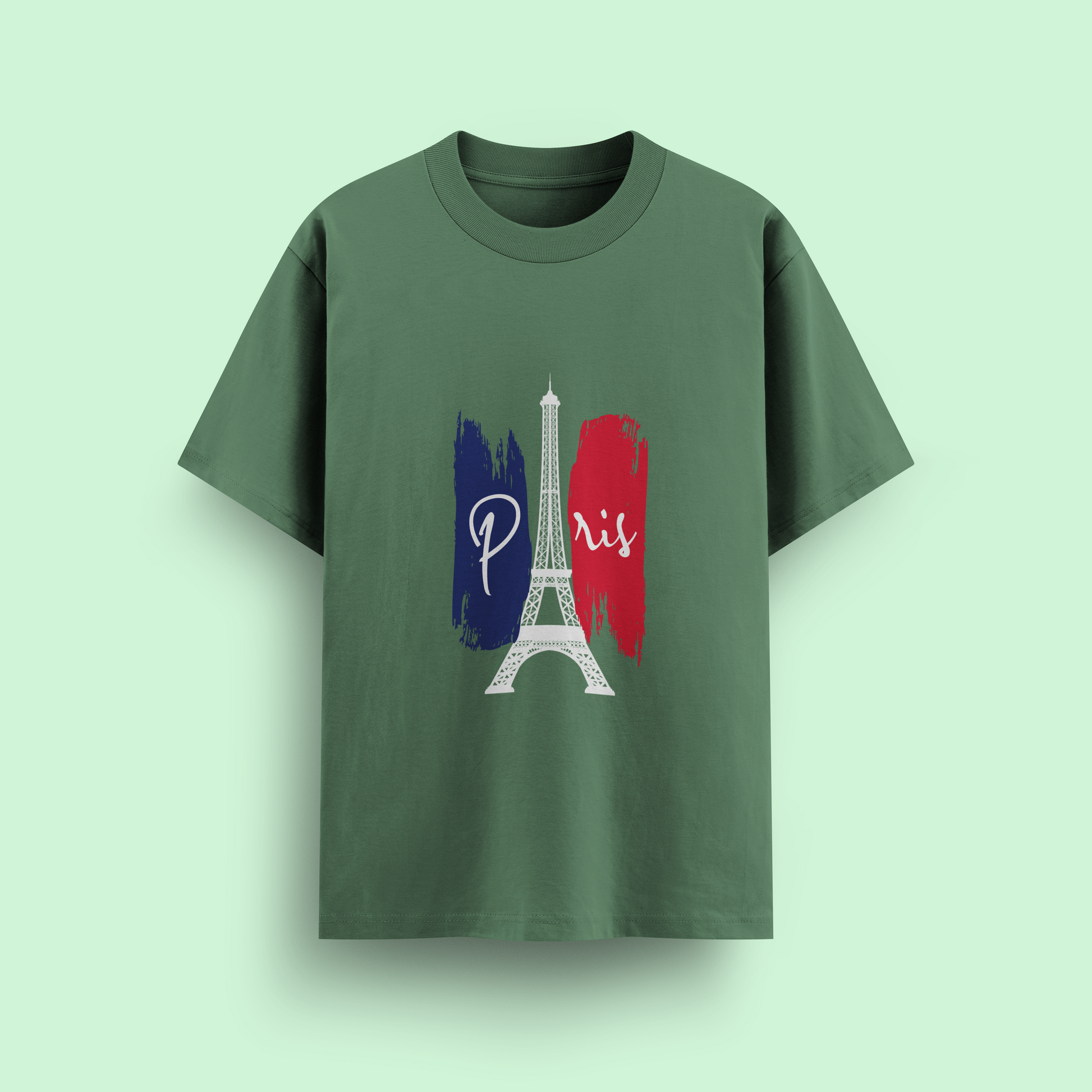 Green oversize t-shirt with Eiffel Tower and 'Paris' design on a light green background