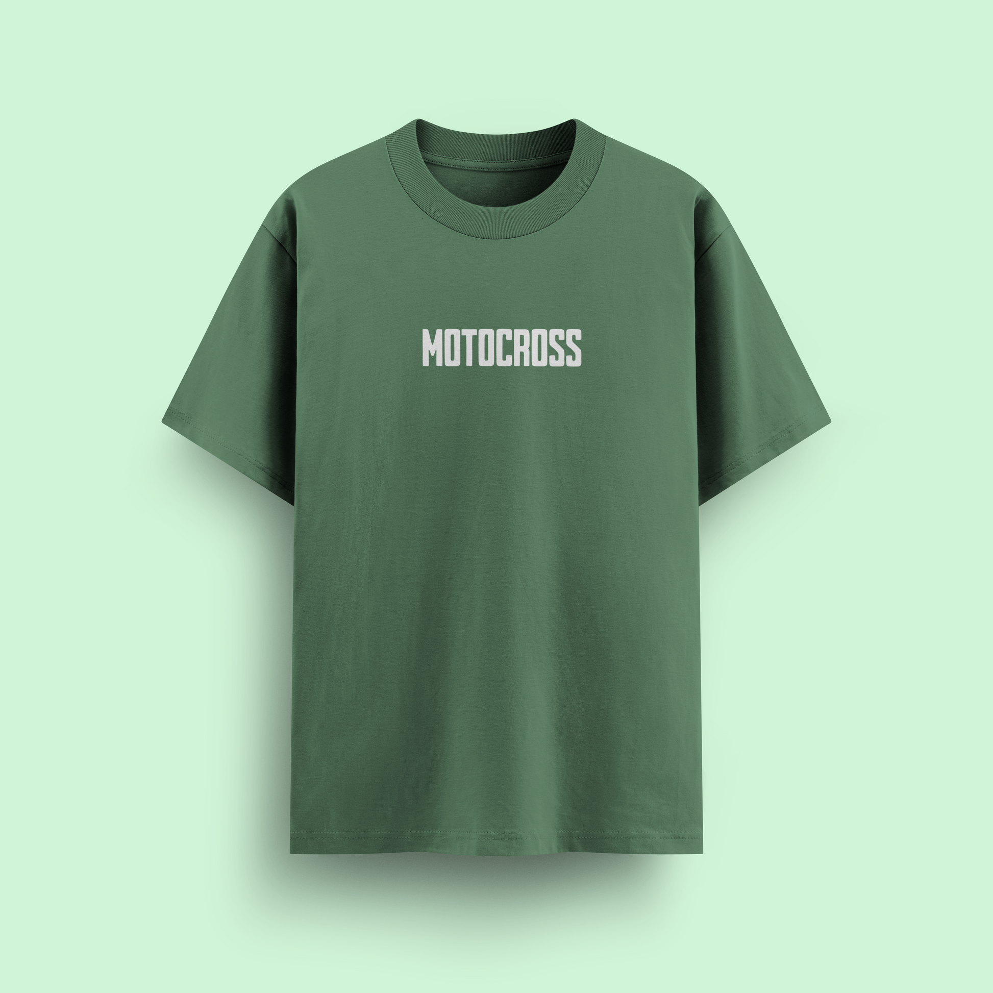 Green t-shirt with 'MOTOCROSS' text on a light green background