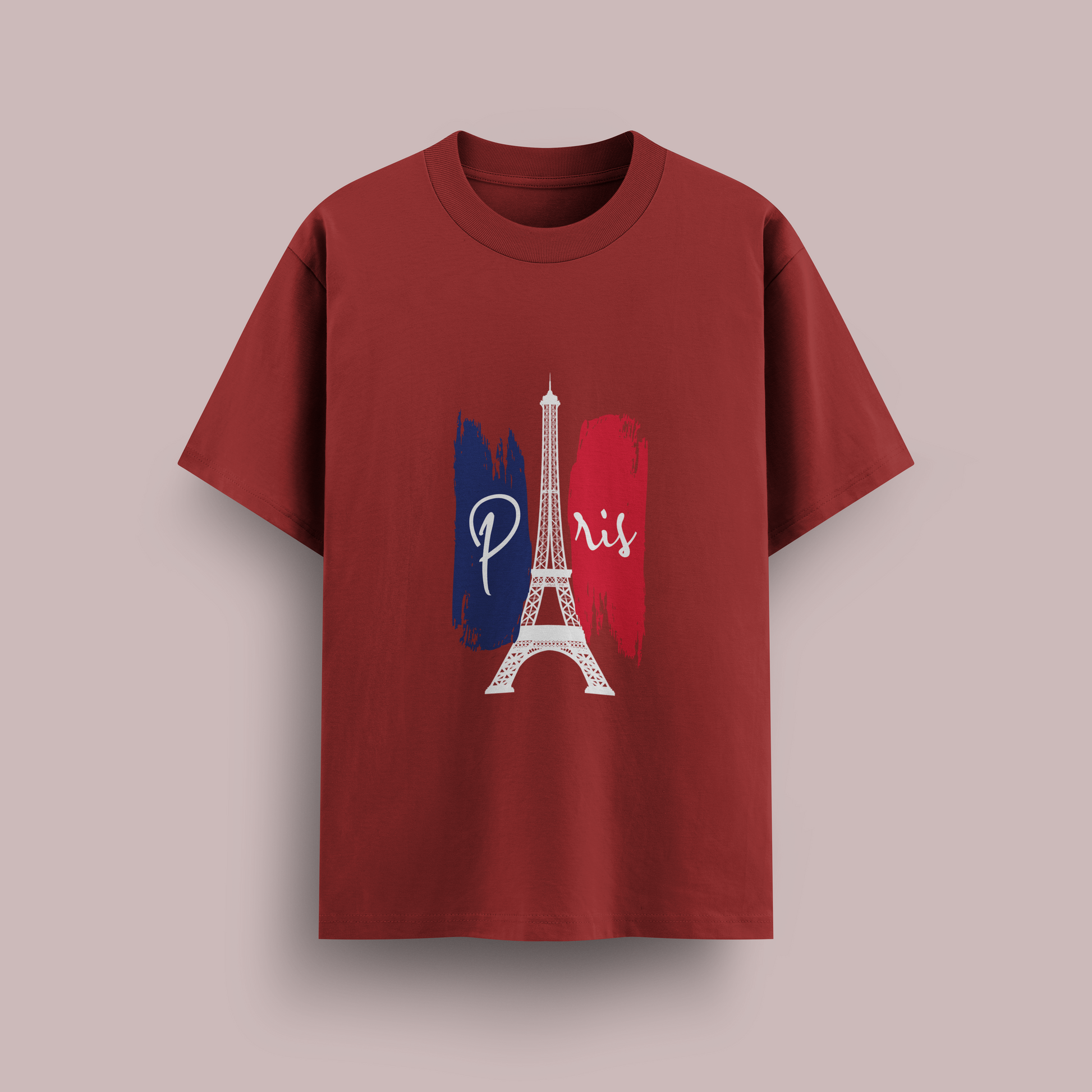 Red oversize t-shirt with Eiffel Tower design on a beige background