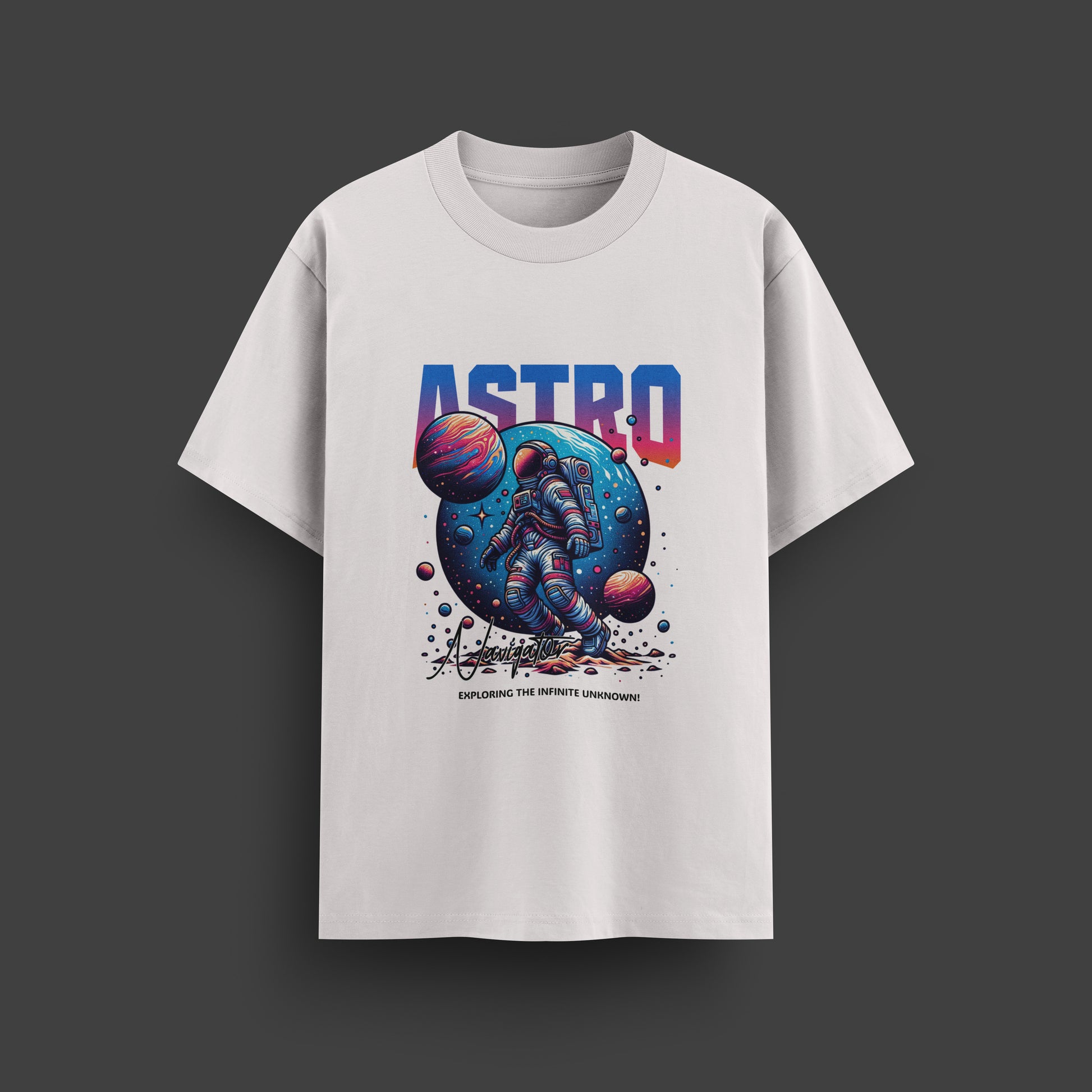 White t-shirt with a colorful 'ASTRO' graphic design featuring an astronaut and planets on a dark background.