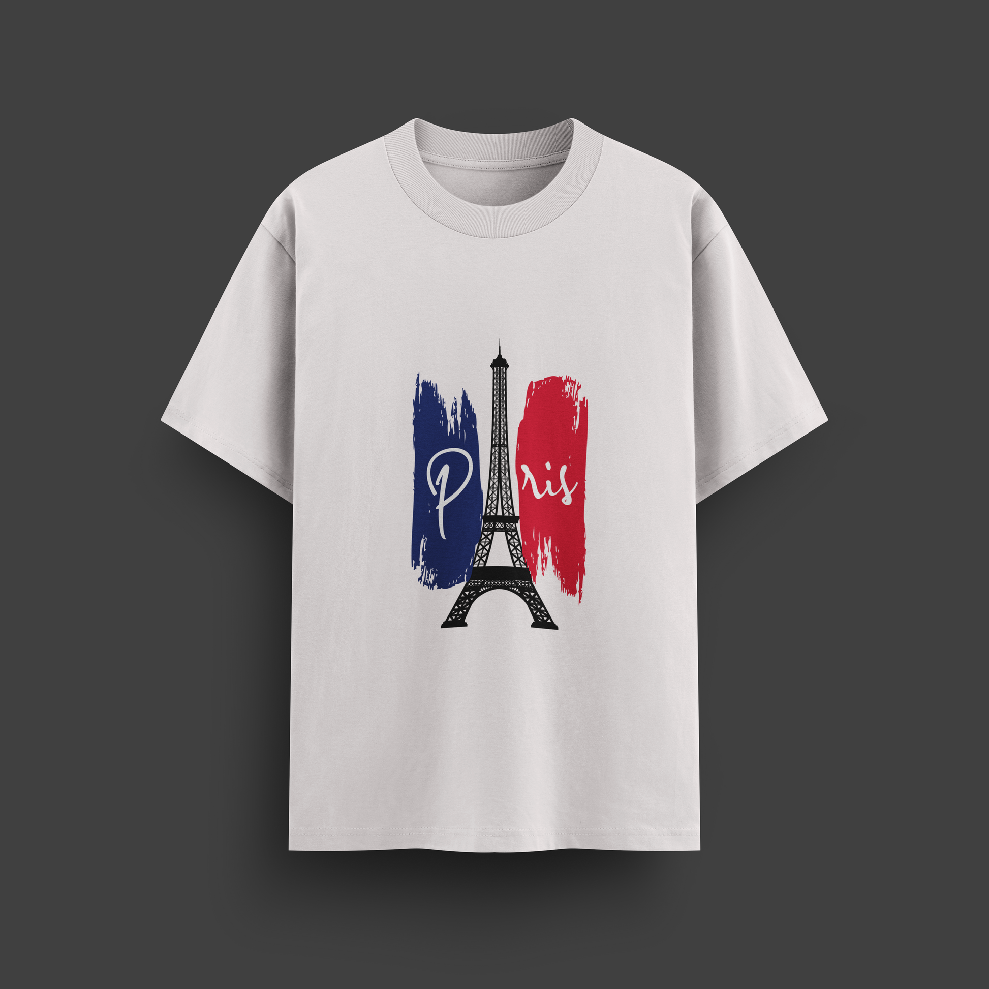 White oversize t-shirt with Eiffel Tower and 'Paris' design on a dark background