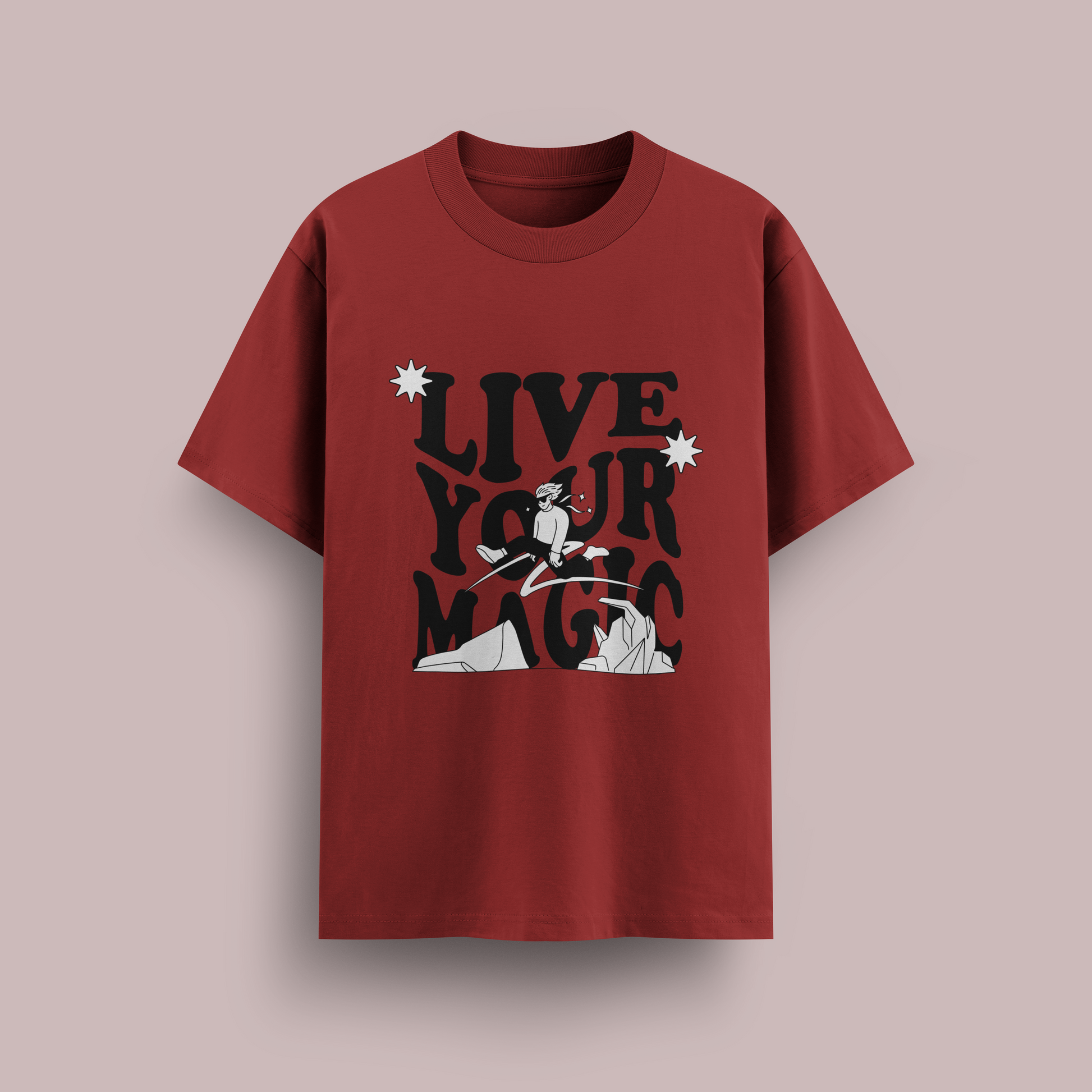 Red t-shirt with 'Live Your Magic' text and graphic on a beige background