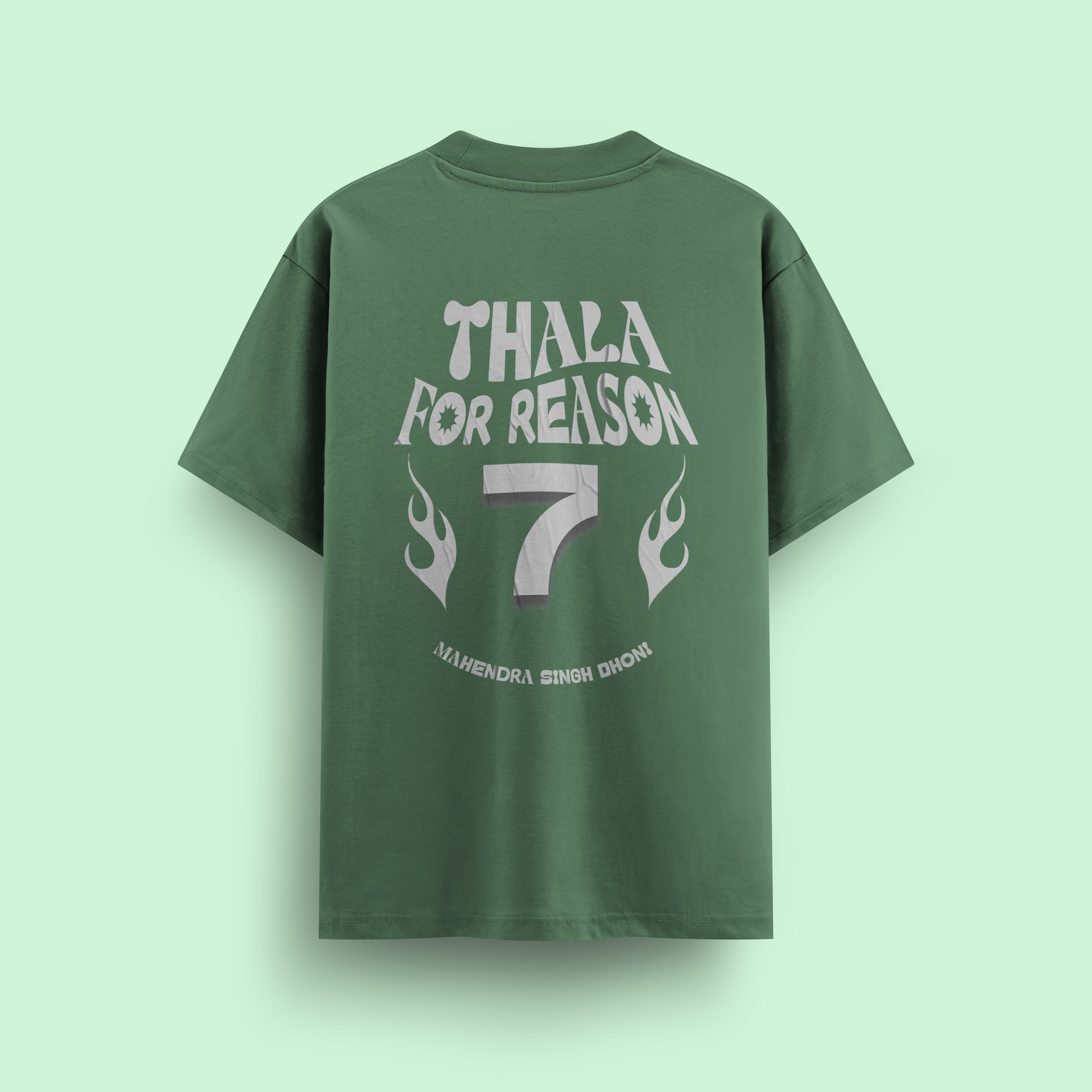 Green t-shirt with text on the back against a light green background
