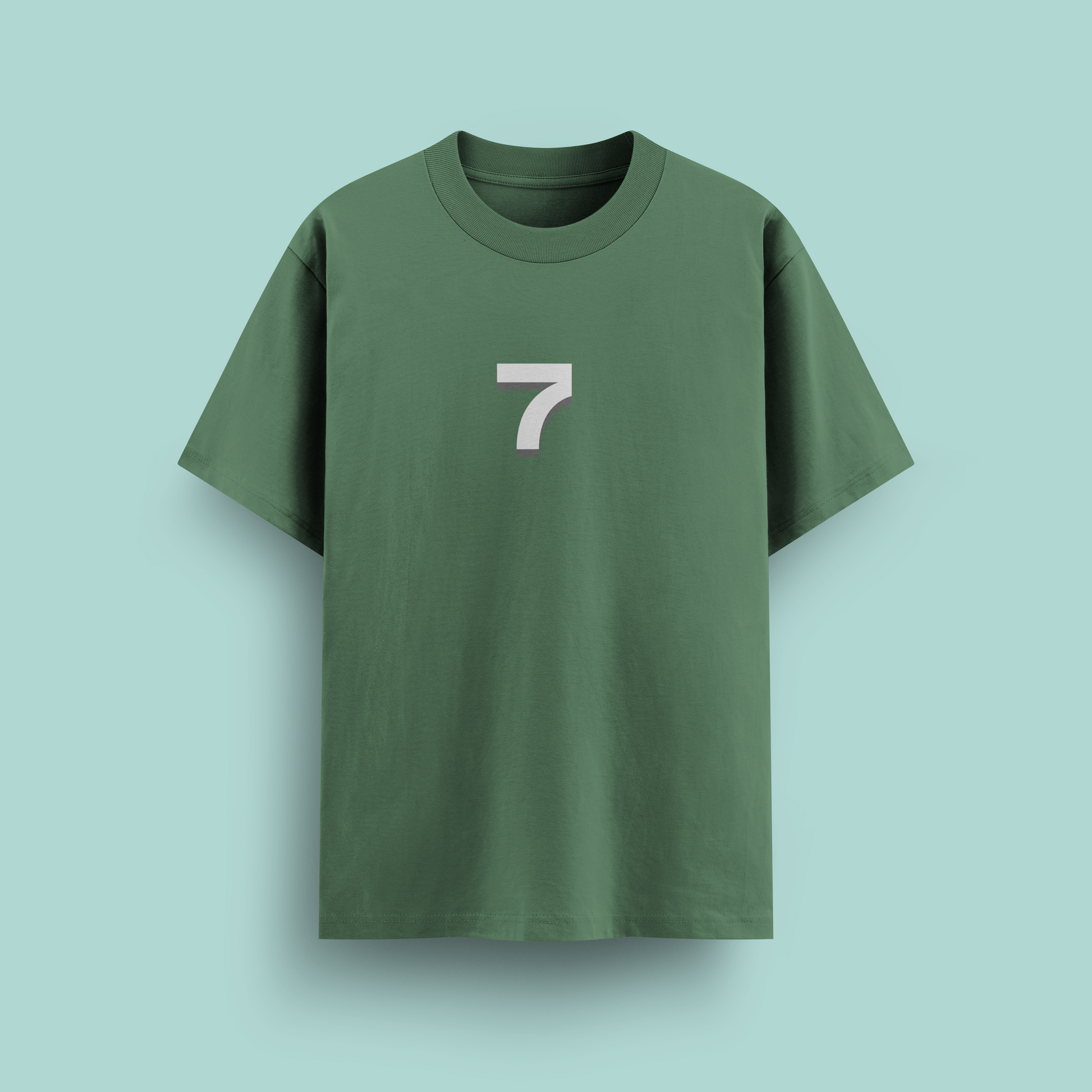 Green t-shirt with a white number '7' on a light blue background