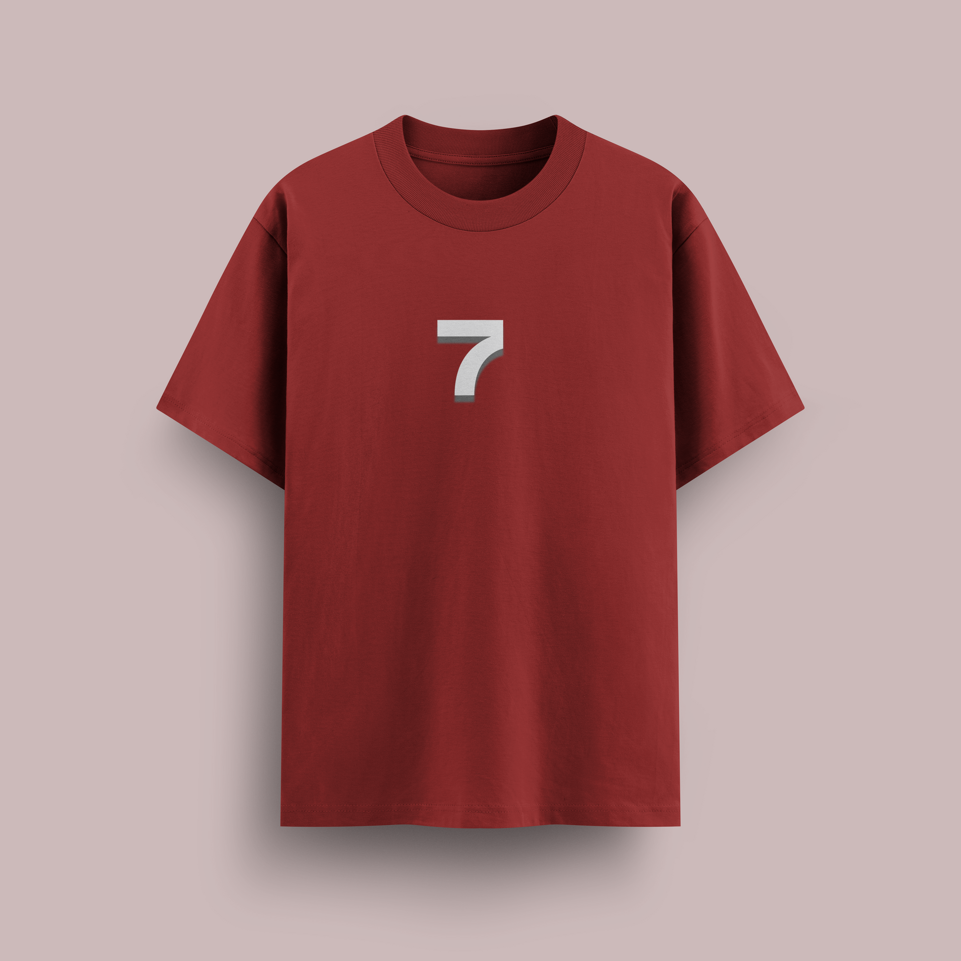 Red t-shirt with a white number 7 on a beige background