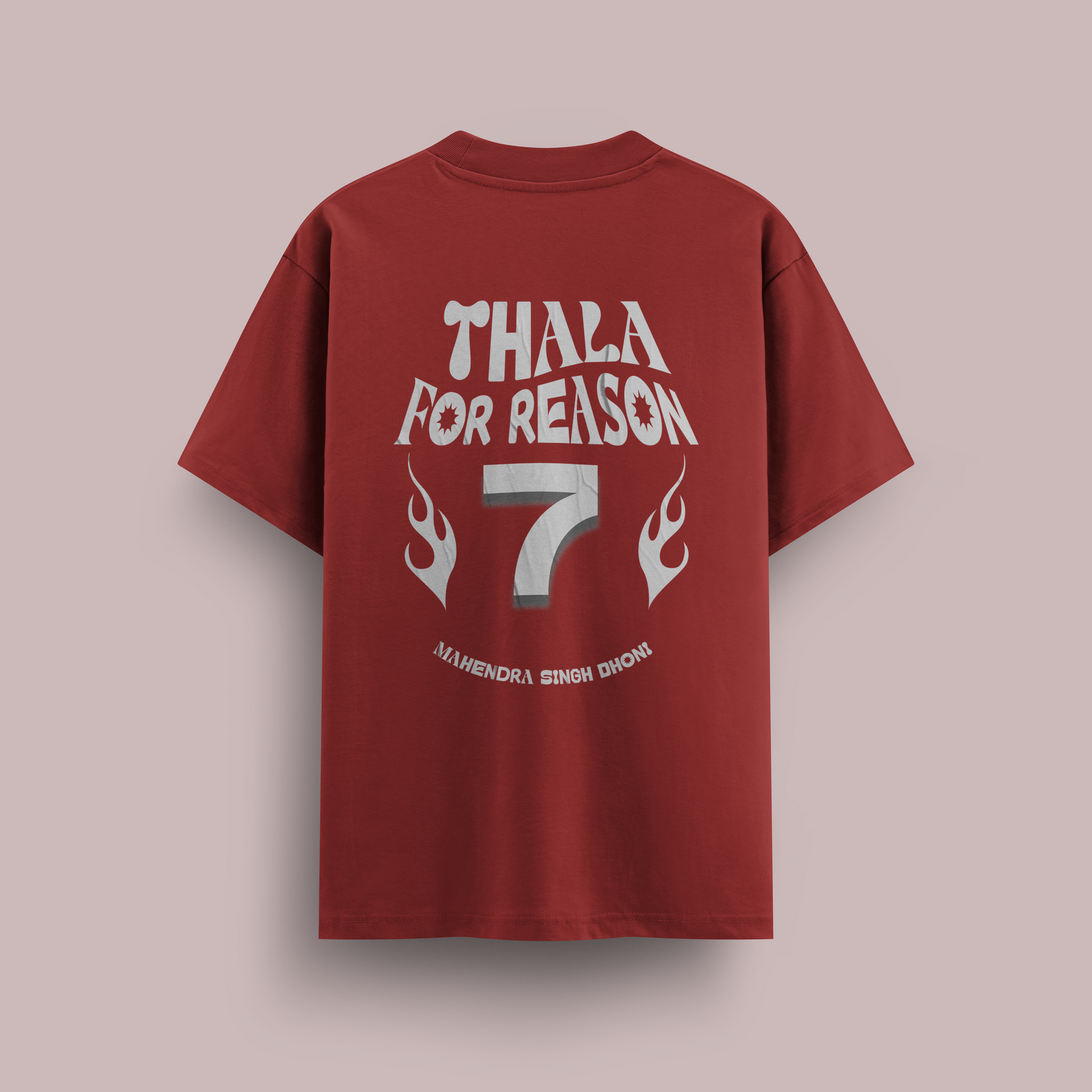 Red t-shirt with white text and flames on a beige background